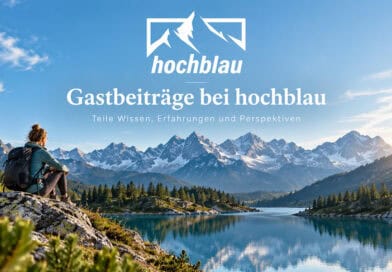 Gastbeiträge bei hochblau – Wanderin an einem Bergsee vor alpiner Bergkulisse.